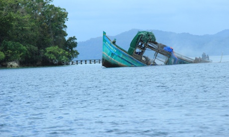 An illegal Vietnamese vessel caught with shark fins & endangered turtles is sunk in the Raja Ampat archieplago off the coast of West Papua, Indonesia