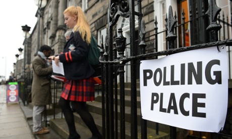 A young voter leaves a polling station after casting her vote in Edinburgh, Scotland, on September 18, 2014, during a referendum on Scotland's independence.