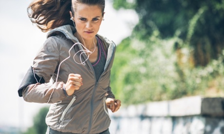 A woman running in the park.=