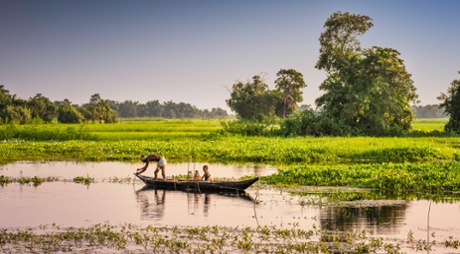 Fishing in a lagoon on Majuli Island, Assam.