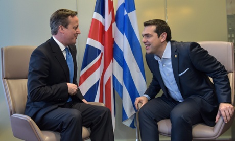 Great Britain's Prime Minister David Cameron (left) sits together with Greece's Prime Minister Alexis Tsipras.