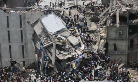 People try to rescue garment workers trapped under rubble at the Rana Plaza complex