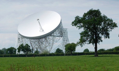The radio telescope tries to pick up signals from a pulsar as the star spins on its axis.
