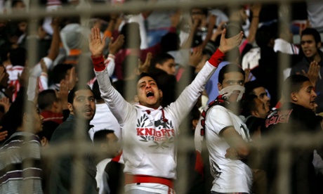 A member of the Ultras White Knights cries during Zamalek's match with and ENPPI in Cairo.