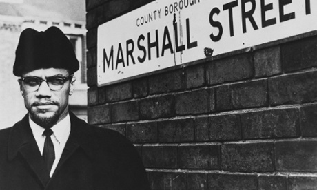 Civil rights activist Malcolm X on Marshall Street in Smethwick, near Birmingham, a few weeks before he was shot.