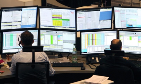 Traders at the Frankfurt stock exchange as Dax hits a new high.