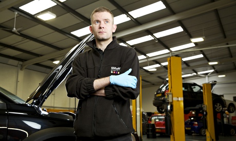 Dan Stears working at Salford's Smart garage.
