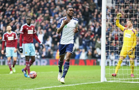 The West Ham United defence look for an offside decision as Brown Ideye celebrates as he scores his third goal in three games for West Brom.