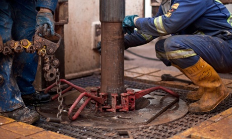 Engineers on the drilling platform of a shale fracking facility