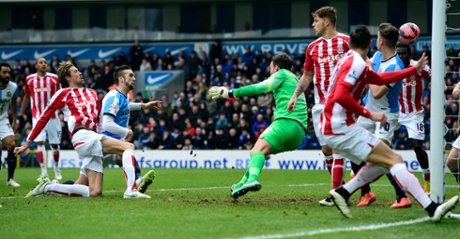 Peter Crouch scores the opening goal, his third for Stoke this week.
