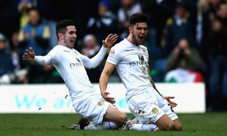 Leeds' Alex Mowatt and Lewis Cook celebrate.