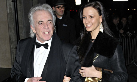 Peter Stringfellow and Bella Wright arrive at theblack and white ball.  
