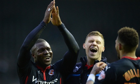 Yakubu and his Reading team-mates celebrate after their FA Cup win.