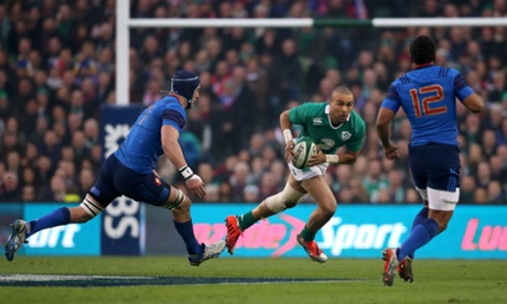 Ireland's Simon Zebo takes on Bernard Le Roux and Wesley Fofana of France.