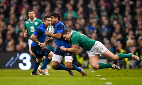 Robbie Henshaw tackles France's Wesley Fofana.