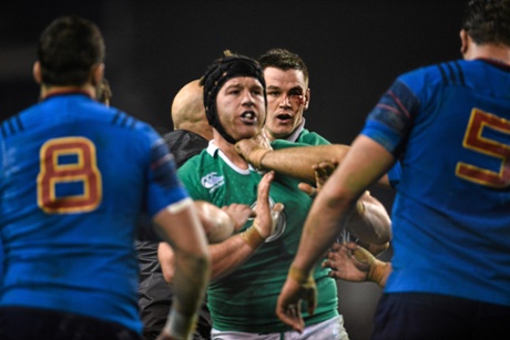 An injured Jonathan Sexton looks on behind teammate Sean O'Brien after picking up a blood injury.
