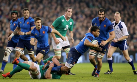 Sean O'Brien tackles France's Wesley Fofana.