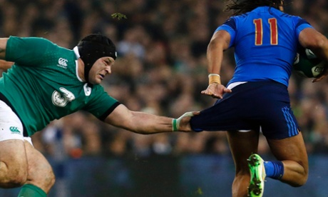 Rory Best tackles France's Teddy Thomas.