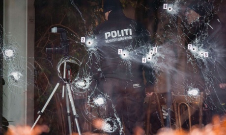 Police work at the scene of the cafe shooting in Copenhagen, where one man was killed