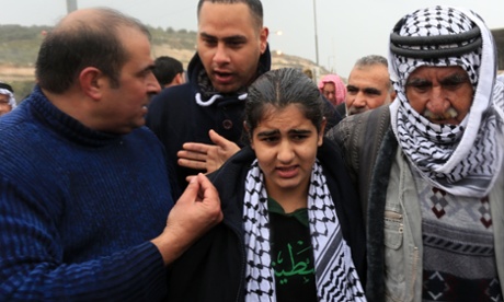 Palestinian teen Malak al-Khatib arrives at Jebara checkpoint near the West Bank city of Tulkarem after being released from prison.