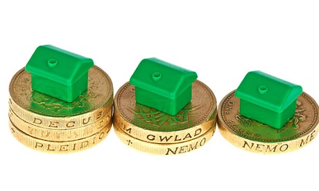 Monopoly houses on coins