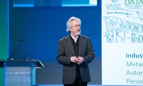 Sandy Pentland speaks on stage at a former event.