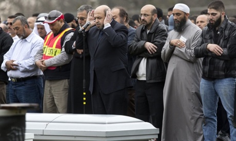 Dr Mohammad Abu-Salha in prayer at Chapel Hill victims' funeral