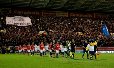 The teams walk out to a raucous Deepdale.