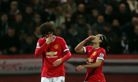Falcao advises Mauroane Fellaini on how to stop his nose bleed; not too much to get excited as the first half draws to a close.