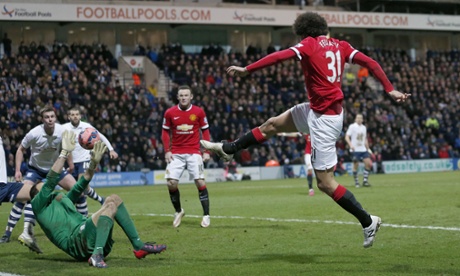 Fellaini smashes the ball home after reacting quickly to the rebound from Stuckmann's save.