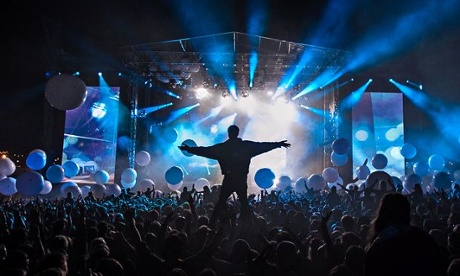The crowd at Bestival, Isle of Wight, enjoying a set by Fatboy Slimin 2013 