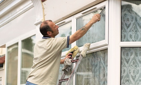 A window cleaner at work