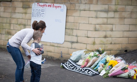 Tribute flowers and messages are left at the site of the fatal tipper truck crash in Weston.