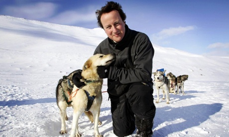 David Cameron stands on top of the Scott-Turner glacier with husky Troika on the island of Svalbard, in 2006.