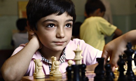 Eight-year-old David Ayrapetyan plays a game of chess at school in Yerevan, Armenia.