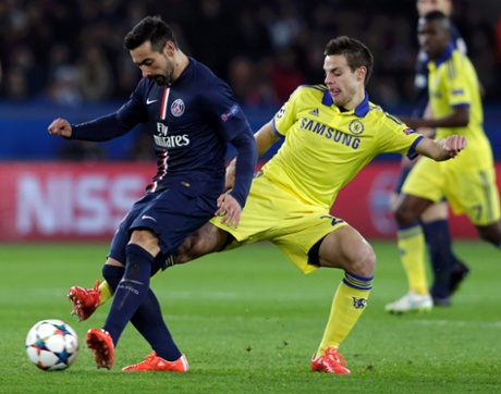 Chelsea's Cesar Azpilicueta concentrates as he tries to dispossess Paris St Germain's Ezechiel Lavezz.