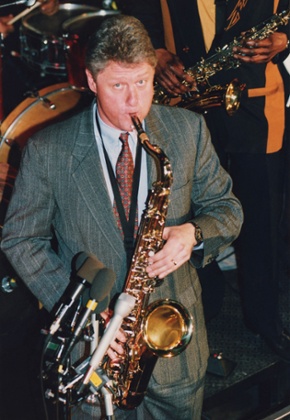 90s The Decade that Connected Us 21 Jan 1991, Washington, DC, USA --- At a campaign fund raiser, Arkansas Governor Bill Clinton plays the saxophone. ---American, Bill Clinton, Caucasian ethnicity, Exploration, German