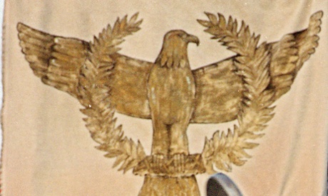 An eagle covered in laurel leaves, symbol of the Roman Empire.