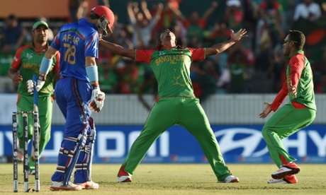 Bangladesh bowler Rubel Hossain celebrates taking the wicket of Afsar Zazai of Afghanistan.