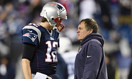 New England Patriots quarterback Tom Brady and head coach Bill Belichick talk on the field