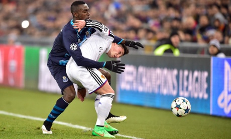 Porto forward Jackson Martinez, left, has trouble getting past Basel midfielder Taulant Xhaka.