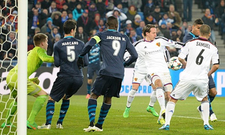 Porto's Casemiro, right, prods the ball home.