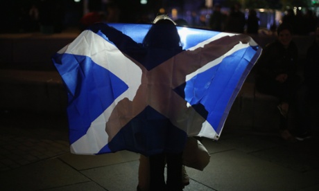 A young girl has her photograph taken as people wait for a result outside the Scottish Parliament as voting in the referendum continues on September 18, 2014 in Edinburgh, Scotland.
