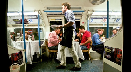 Dinner is served on the Underground Supper Club tube carriage.
