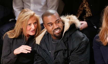 Ricky Lauren and Kanye West admire the collection. 