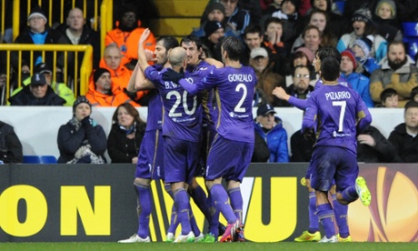 Fiorentina's Jose Maria Basanta celebrates with his team-mates.