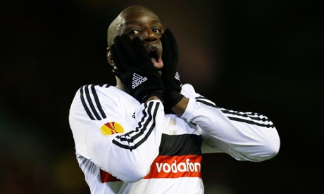 Demba Ba looks dejected after missing a chance to score.
