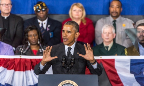 Obama speaks to the crowd at Gwendolyn Brooks College Prep.