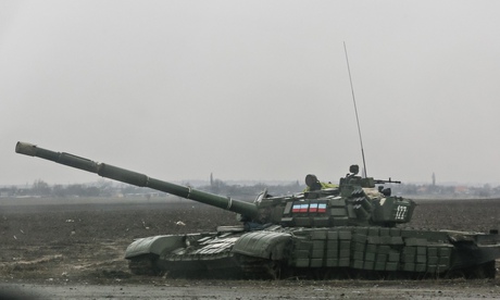A pro-Russia separatist tank on a road in Yenakieve town, northeast from Donetsk, on Monday.