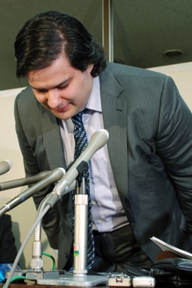 Mark Karpeles, president of MtGox bitcoin exchange bows his head during a press conference in Tokyo after the hack.
